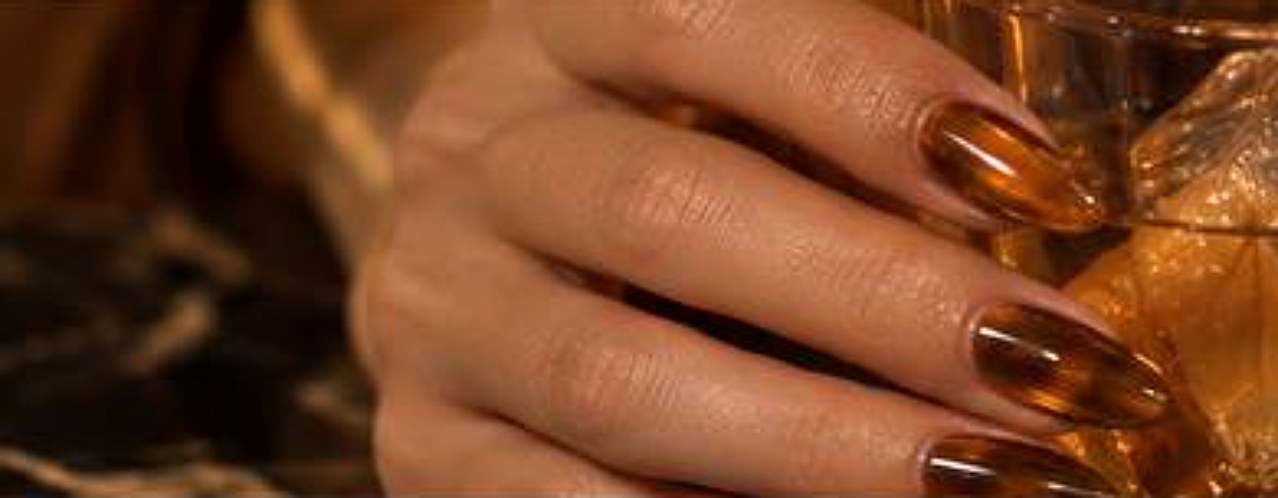 Jelly brown manicure with transparent amber depth